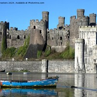Buy canvas prints of Conwy Castle and boats on a February day by Mark Chesters