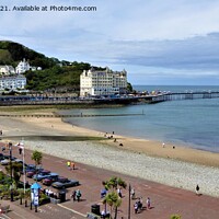 Buy canvas prints of Llandudno Grand Pier with the Welsh flag by Mark Chesters