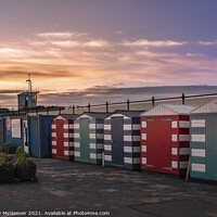 Buy canvas prints of Sunset Beach Huts  by Anthony McGeever