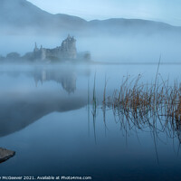 Buy canvas prints of A misty sunrise on Kilchurn Castle  by Anthony McGeever