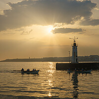Buy canvas prints of Rowing Boats and Anstruther Lighthouse by Anthony McGeever