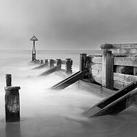 Buy canvas prints of Seaton Groynes B&W  by Anthony McGeever