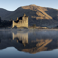Buy canvas prints of Golden light on Kilchurn Castle  by Anthony McGeever