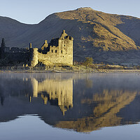 Buy canvas prints of Golden Hour on Kilchurn Castle  by Anthony McGeever