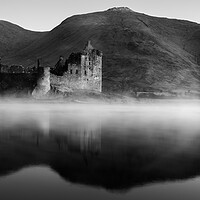 Buy canvas prints of Misty Reflections of Kilchurn Castle by Anthony McGeever