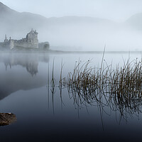 Buy canvas prints of Pre Dawn Mist on Kilchurn Castle  by Anthony McGeever