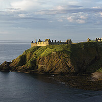 Buy canvas prints of Dunnottar Castle Sunrise  by Anthony McGeever