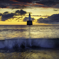 Buy canvas prints of Dramatic Sunrise at Rattray Lighthouse by Anthony McGeever