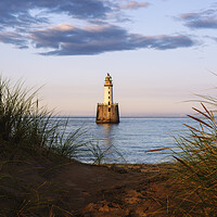 Buy canvas prints of Coastal Lighthouse Sunset  by Anthony McGeever