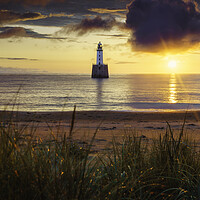 Buy canvas prints of Dawn's Embrace at Rattray Lighthouse by Anthony McGeever