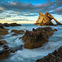 Buy canvas prints of Bow Fiddle Rock Sunset  by Anthony McGeever