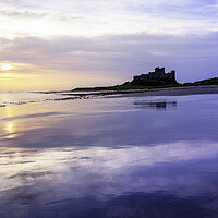 Buy canvas prints of Sunrise Reflections on Bamburgh Beach  by Anthony McGeever