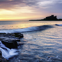 Buy canvas prints of Ethereal Sunrise on Bamburgh Beach  by Anthony McGeever
