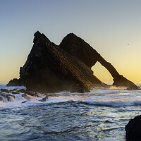 Buy canvas prints of Golden Sunrise on Bow Fiddle Rock by Anthony McGeever