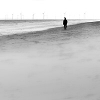 Buy canvas prints of Solitary Man walking on the beach at Huttoft on the Lincolnshire Coast by That Foto