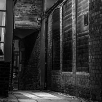 Buy canvas prints of Pawnbrokers alley in Louth at night and in monochr by That Foto