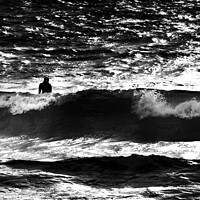 Buy canvas prints of Silhouetted surfer in a large wave by That Foto