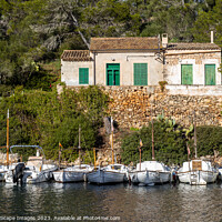 Buy canvas prints of Old fisherman's house and boats in Cala Figuera by MallorcaScape Images