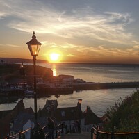 Buy canvas prints of Sunset at Whitby  by Sue Walker