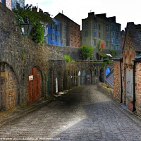 Buy canvas prints of The cobbled streets of Tenby, Wales by Sue Walker
