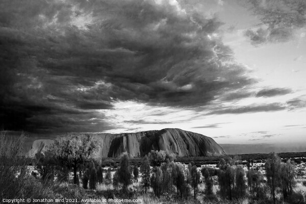 Storm Clouds over Uluru Picture Board by Jonathan Bird