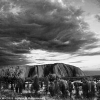 Buy canvas prints of Storm Clouds over Uluru by Jonathan Bird