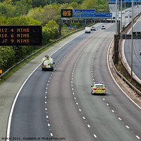 Buy canvas prints of A police car responding to an emergency on the M60 motorway in UK by Krystian Wolski