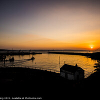 Buy canvas prints of Sunrise at Newlyn Harbour as the first boat goes out. by Ed Whiting