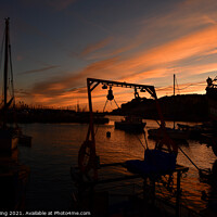 Buy canvas prints of Brixham Harbour at sunset. by Ed Whiting