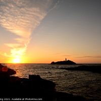 Buy canvas prints of Sunset at Godrevy. by Ed Whiting