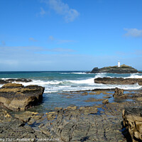 Buy canvas prints of Lighthouse at Godrevy by Ed Whiting