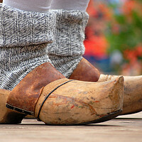 Buy canvas prints of Wooden clogs by Massimiliano Leban