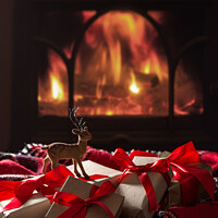 Buy canvas prints of Christmas Gifts By The Fireplace by Amanda Elwell