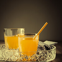 Buy canvas prints of Glasses Of Orange Juice by Amanda Elwell