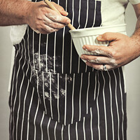 Buy canvas prints of Baker In Apron by Amanda Elwell