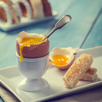 Buy canvas prints of Boiled Egg With Spoon by Amanda Elwell