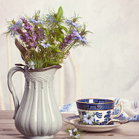 Buy canvas prints of Flowers In Antique Jug With Teacup by Amanda Elwell