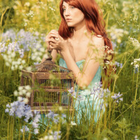 Buy canvas prints of Woman In Bluebell Flowers by Amanda Elwell