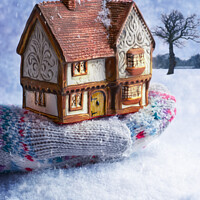 Buy canvas prints of Winter Cottage In Gloved Hand by Amanda Elwell