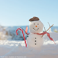 Buy canvas prints of Happy Smiling Snowman With Candy Cane by Amanda Elwell