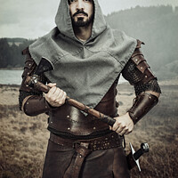 Buy canvas prints of Medieval Cosplay Man With Axe by Amanda Elwell