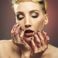 Buy canvas prints of Young Woman With Glittered Hands And Lips by Amanda Elwell