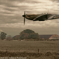Buy canvas prints of Mark 1 Supermarine Spitfire Flying Past Hanger by Amanda Elwell
