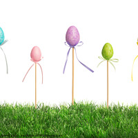 Buy canvas prints of Easter Eggs In Grass by Amanda Elwell