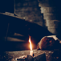 Buy canvas prints of Candle Wedged In Axe by Amanda Elwell