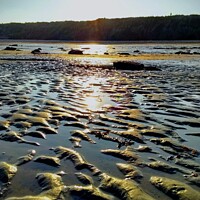Buy canvas prints of Rocky Beach ripples at Whitley Bay by Tina Veeranna