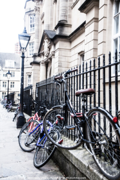Bikes Chained Up Against Railings Outside Oxford University Coll Picture Board by Peter Greenway