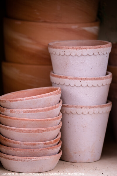 Pile Of Terracotta Flower Pots On A Shelf Picture Board by Peter Greenway