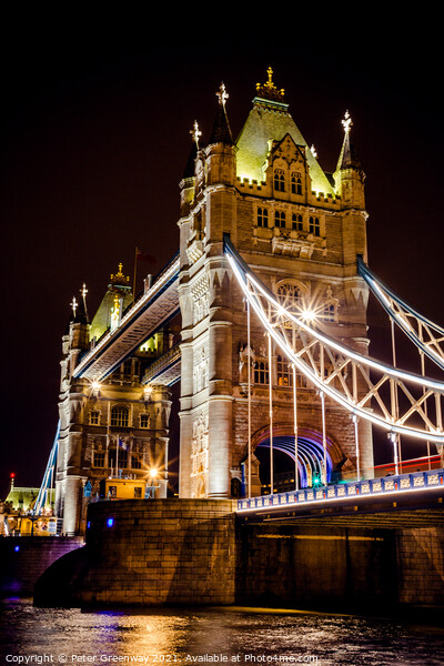 The Iconic Tower Bridge In London At Night Picture Board by Peter Greenway
