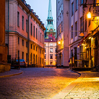Buy canvas prints of Deserted Streets In Gamla Stan, Stockholm At Dusk by Peter Greenway